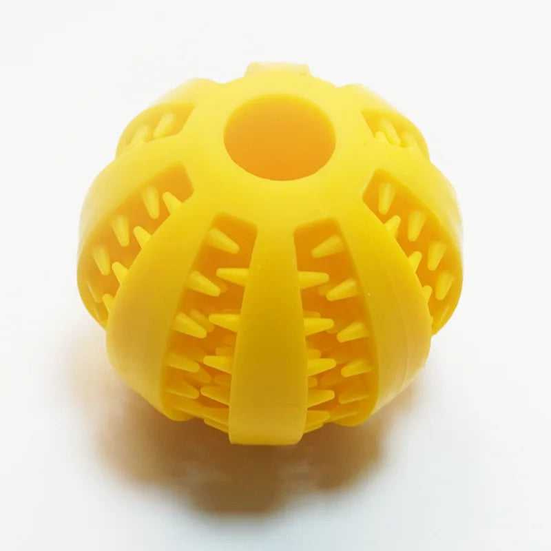 Interactive food leaking ball toy for dog that slowly dispenses treats during playtime to stimulate curiosity and reward play.