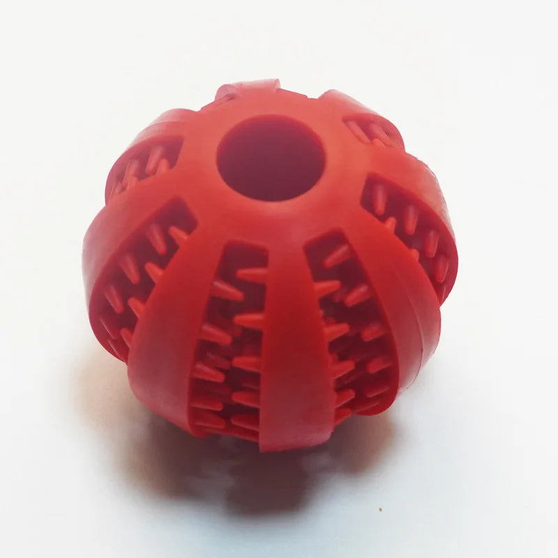 Interactive food leaking ball toy for dog that slowly dispenses treats during playtime to stimulate curiosity and reward play.